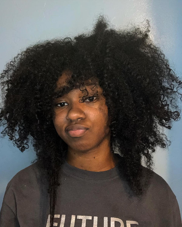 Woman with frizzy curls