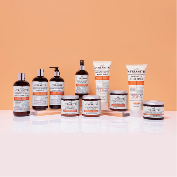 Curlsmith moisture collection on an orange background