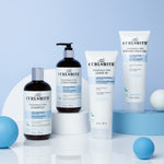 Curlsmith hair care products on a light blue background