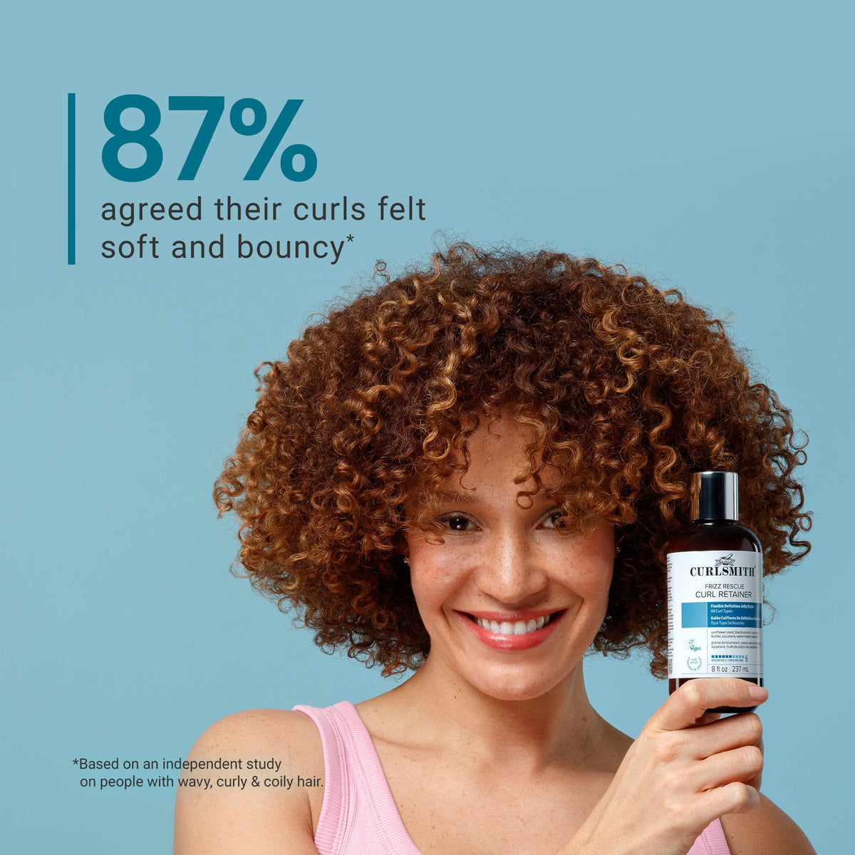 Woman holding a bottle of Curlsuite product with text about curl satisfaction on a blue background