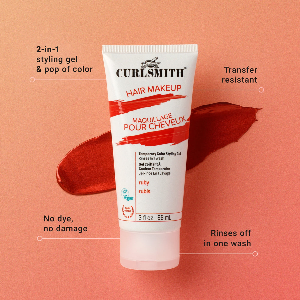Curlsmith hair makeup tube on a peach background with product features highlighted.