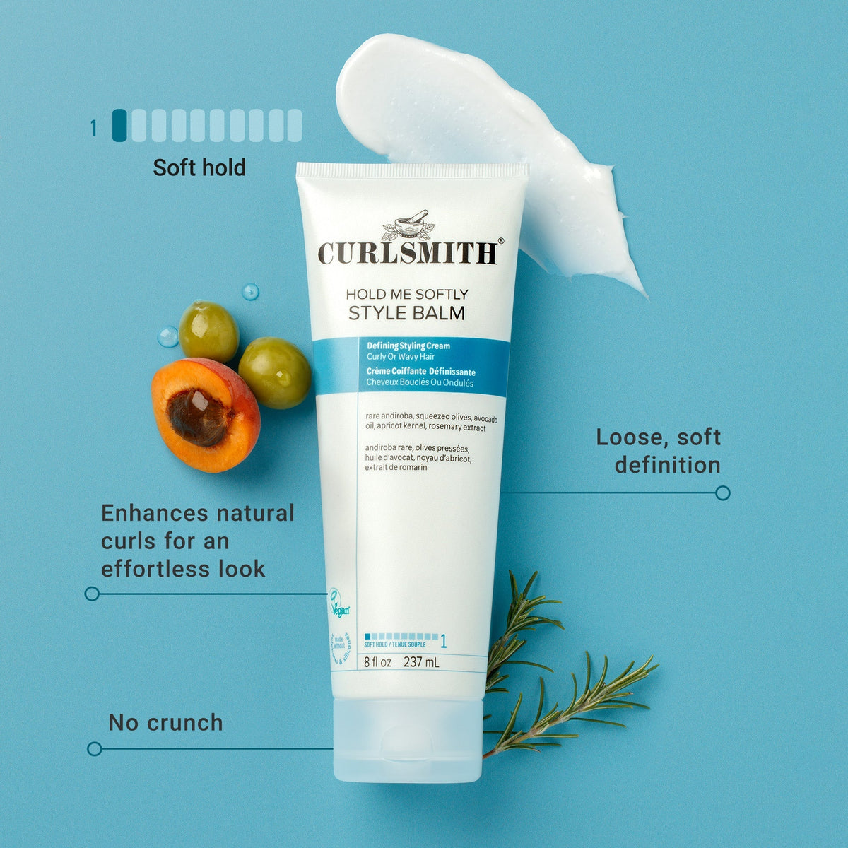Curlsmith styling balm tube with ingredients on a blue background