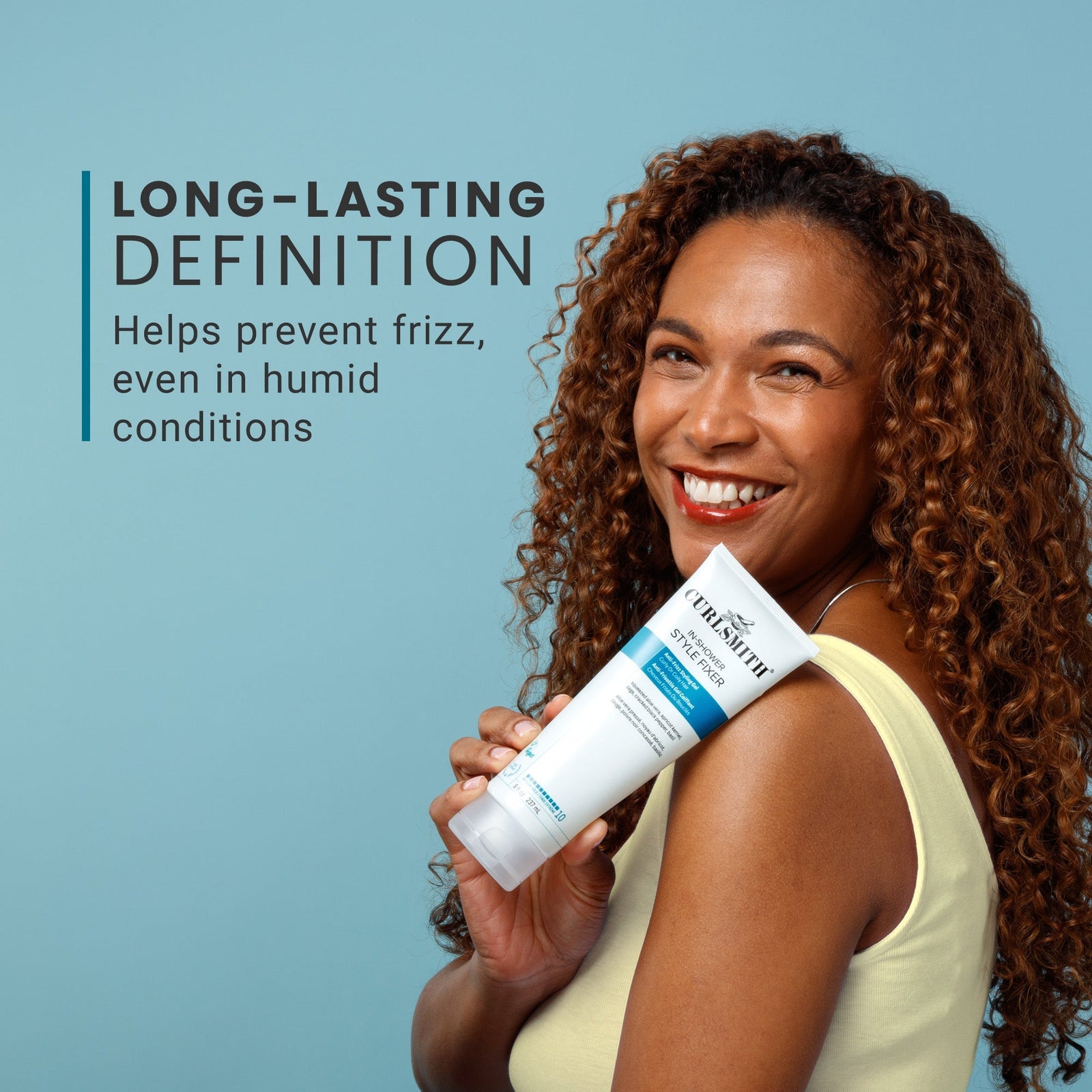 Woman holding a hair product with text about long-lasting definition on a blue background