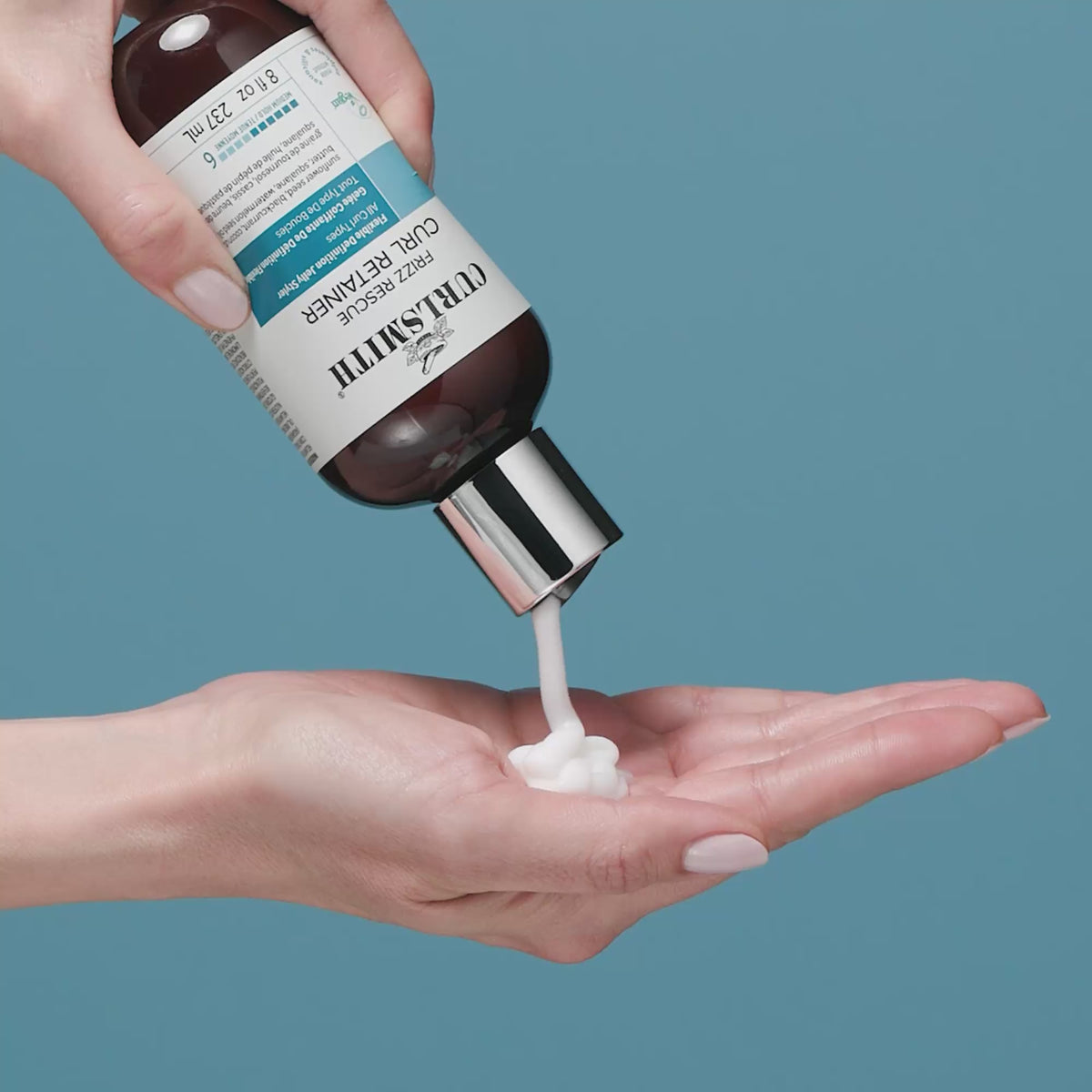 Applying Curlsmith Frizz Rescue Curl Retainer 